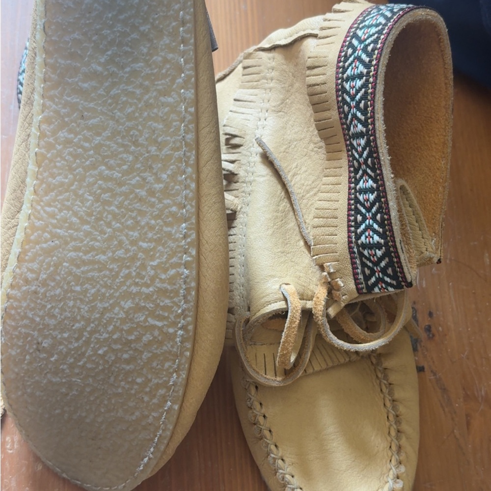 Tan Moccasins with Fringe and Geometric Trim